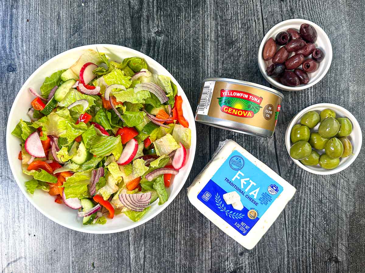 Recipe ingredients - salad, oil packed tuna, feta cheese, Kalamata olives and green olives