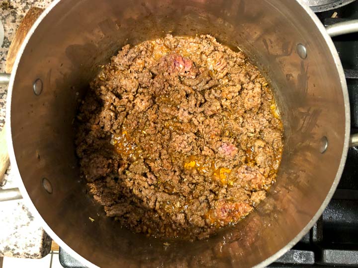 pan with browned and seasoned ground beef