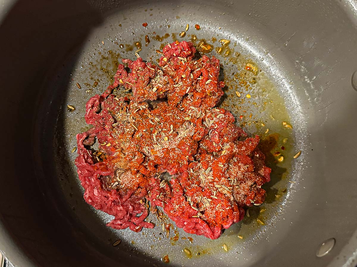 Soup pot with ground beef and spices.