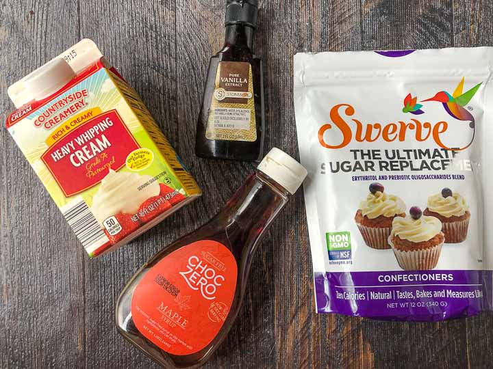 Ingredients for sugar free cream cheese frosting: heavy whipping cream, ChocZero maple syrup, vanilla extract and Swerve sweetener