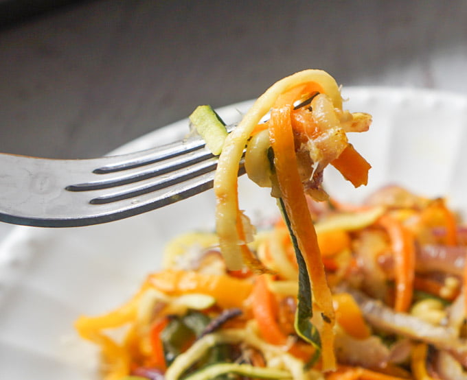 Closeup of veggie noodles on fork.