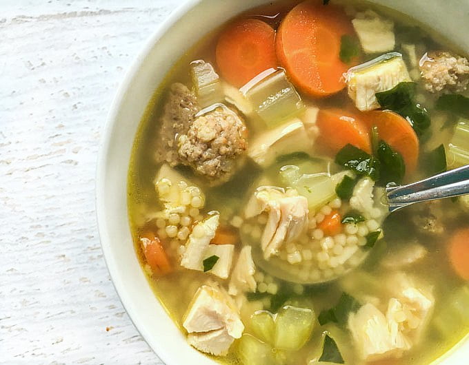 This is the easiest & best wedding soup ever, according to my son and husband! Rich chicken broth, shredded chicken, meatballs and pasta make for a hearty soup. I even have a delicious low carb version too!