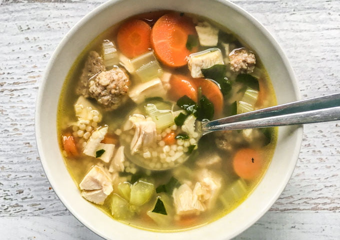 This is the easiest & best wedding soup ever, according to my son and husband! Rich chicken broth, shredded chicken, meatballs and pasta make for a hearty soup. I even have a delicious low carb version too!