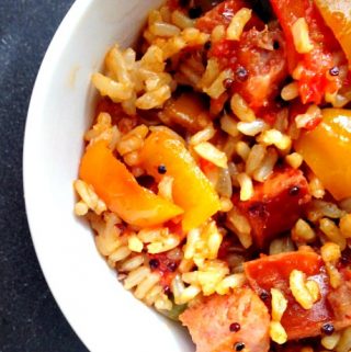 Enjoy a quick and easy meal that very tasty. Cajun peppers & rice with kielbasa is a dish you make in no time at all and you family will really enjoy it!