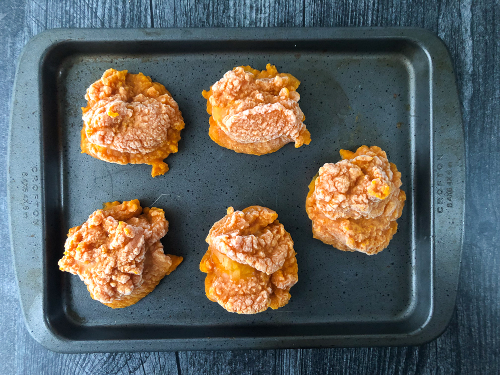 small cookie sheet with frozen pumpkin puree mounds