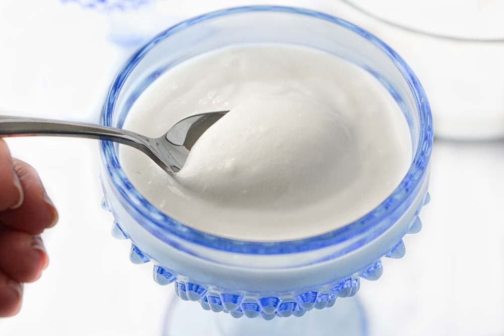 closeup of a spoonful of dairy free yogurt 