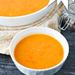 big and small bowls with red pepper and sweet potato soup and text