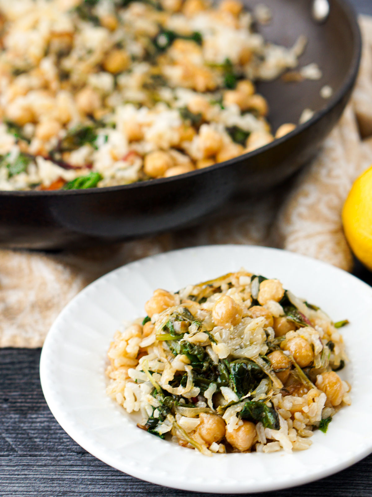 power greens with chickpeas in pan and plate