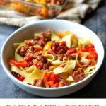 white bowl with pasta with sausage & peppers with text