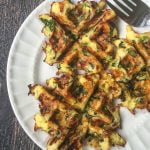These savory breakfast waffles are a great low carb breakfast on the go! Only 1.9g net carbs per small waffle and filled with tasty cheese, bacon and vegetables.