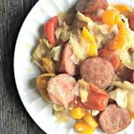 This cabbage & peppers kielbasa casserole is a very quick and easy dish that tastes delicious. Roasting the vegetables gives it an added sweetness that contrasts the bit of the kielbasa. Chop, mix, roast and you are done!