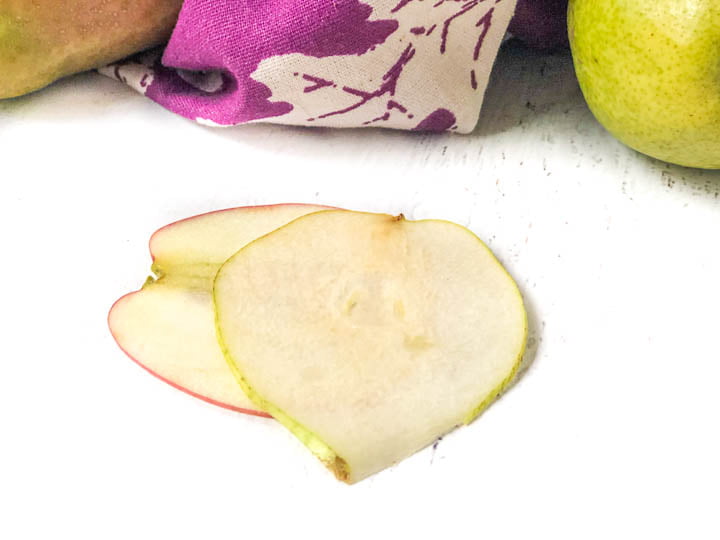 two thin fresh slices of pears