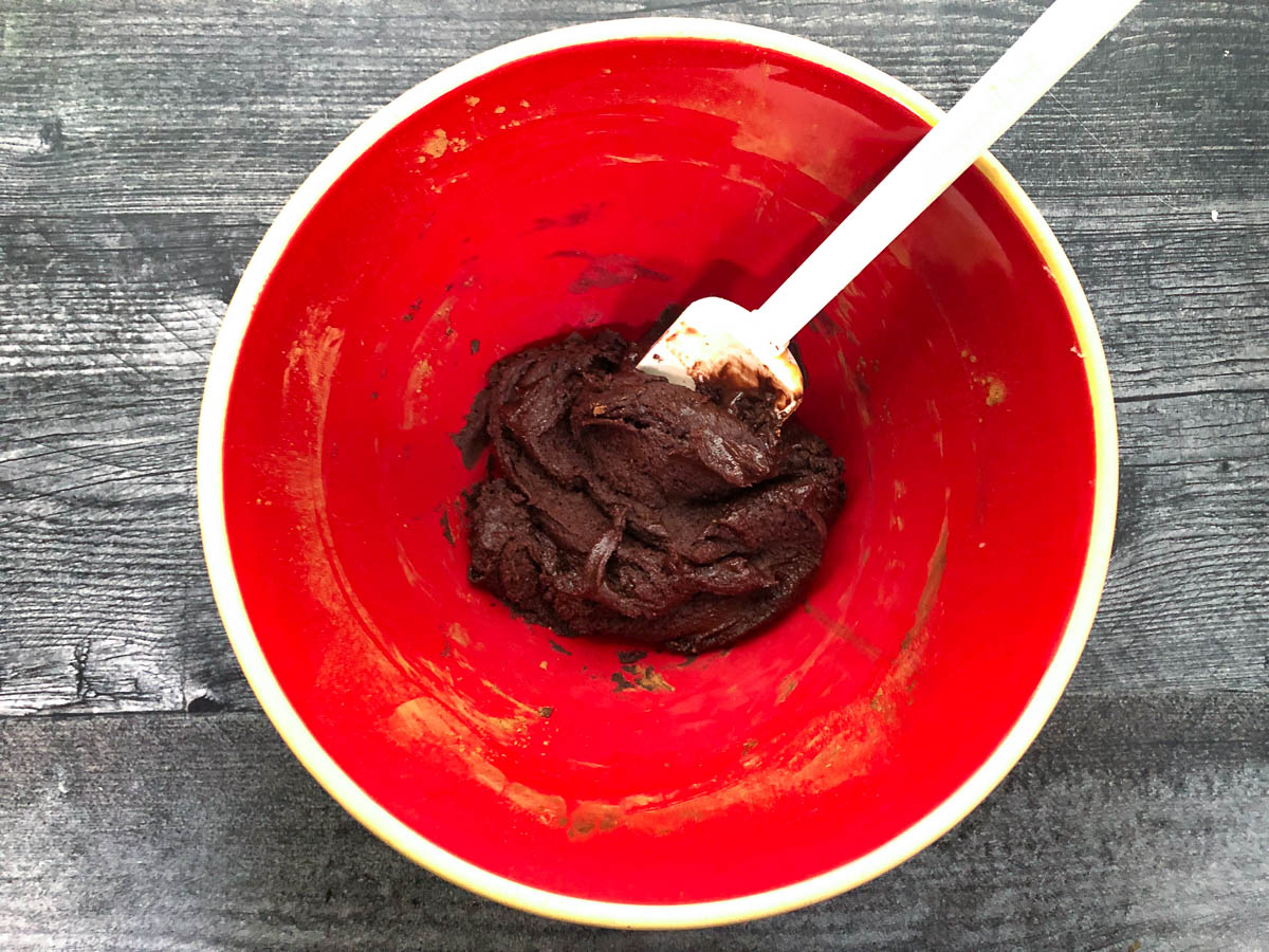 red bowl with tahini chocolate batter