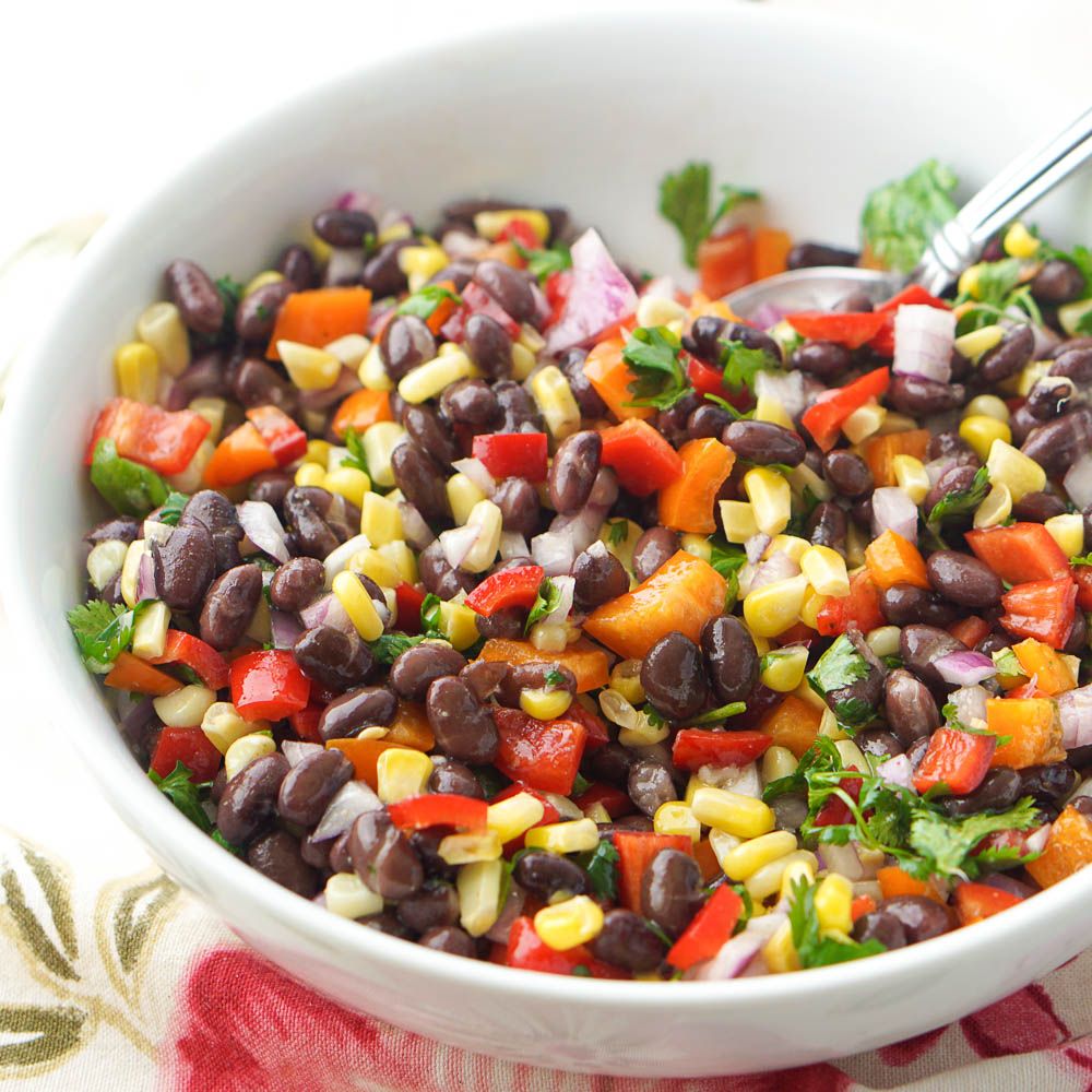 white bowl with Mexican bean salad