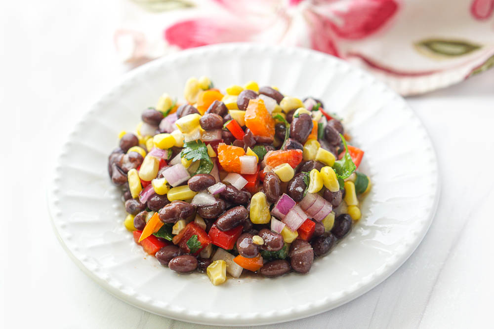 white plate of veggie picnic salad 