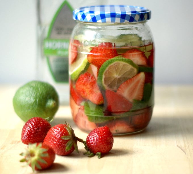 These fruit & herb infused liquors are a fun way to use all that ripe and luscious summer fruit. I have  three delicious flavors for you: strawberry basil gin, apricot ginger vodka and strawberry lime tequila!