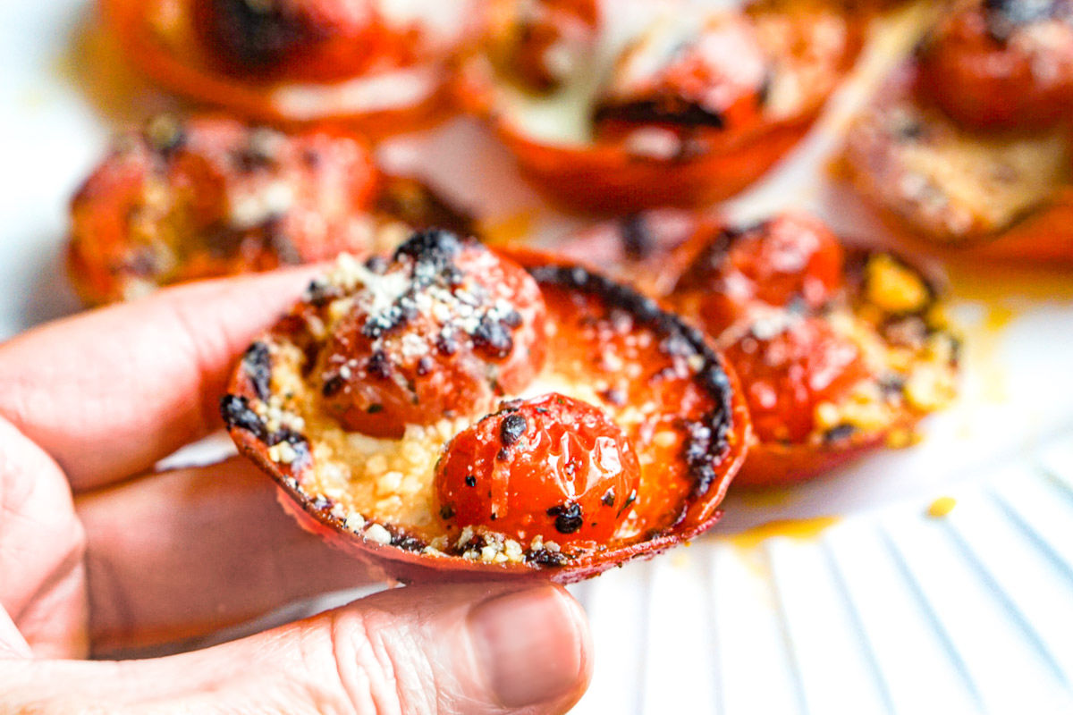 Closeup of a hand holding one of the finished keto snacks.