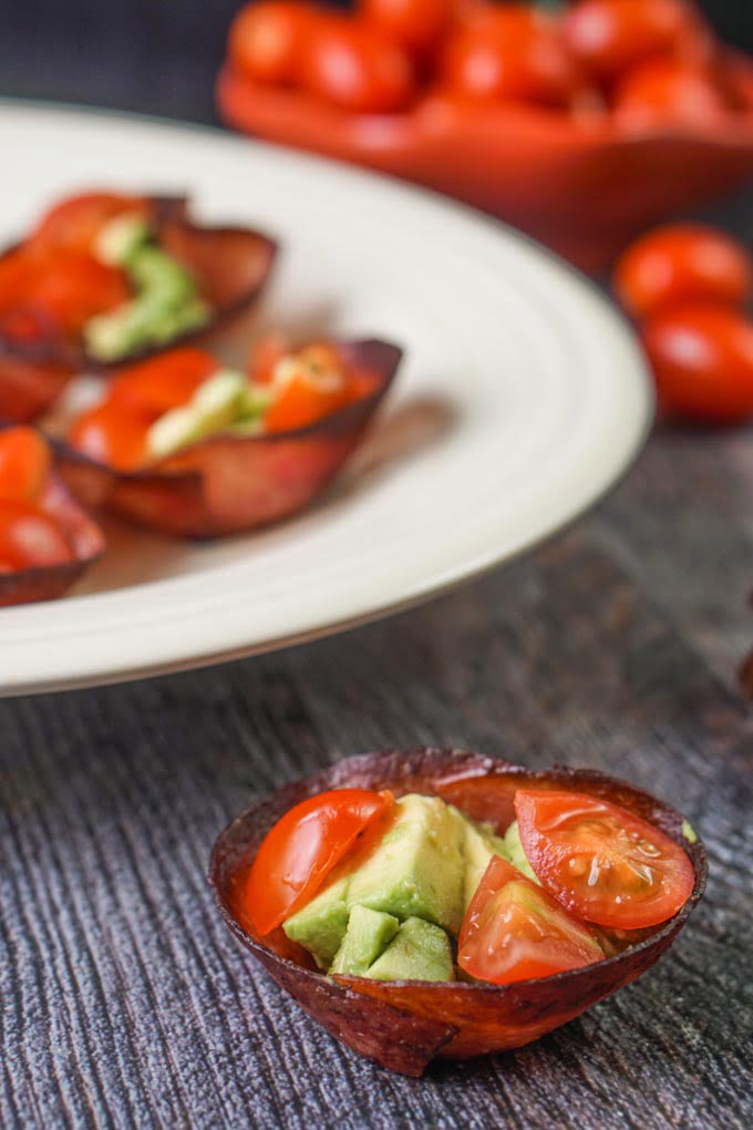 These tomato, avocado and salami bites are the perfect low carb and Paleo snack. Also would make a great low carb appetizer. They are so easy to make and each one has only 0.9g net carbs.