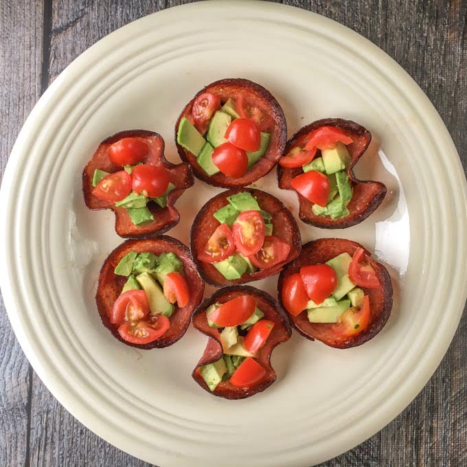 These tomato, avocado and salami bites are the perfect low carb and Paleo snack. Also would make a great low carb appetizer. They are so easy to make and each one has only 0.9g net carbs.