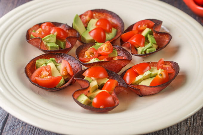 These tomato, avocado and salami bites are the perfect low carb and Paleo snack. Also would make a great low carb appetizer. They are so easy to make and each one has only 0.9g net carbs.