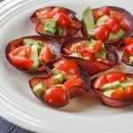 These tomato, avocado and salami bites are the perfect low carb and Paleo snack. Also would make a great low carb appetizer. They are so easy to make and each one has only 0.9g net carbs.