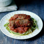 This Paleo Slow Cooker Braciole can be eaten over pasta or zucchini noodles to make it a Paleo meal. Easy, tender and tasty!