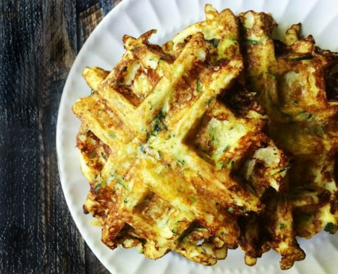 These savory zucchini waffles are gluten free and low carb. They make a great low carb breakfast or snack and you can even freeze them for later. Only 5 ingredients and 3.1g net carbs per waffle.