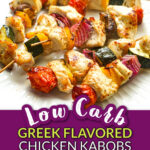 White plate with a skewers of keto Greek Chicken kabobs and text overlay.