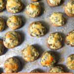baking sheet with keto stuffed mushrooms and text