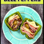 Aqua plate with an antipasto stuffed raw pepper cut in half and text.