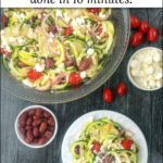closeup of a white plate with zucchini noodle Greek salad with text