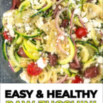 closeup of a white plate with zucchini noodle Greek salad with text