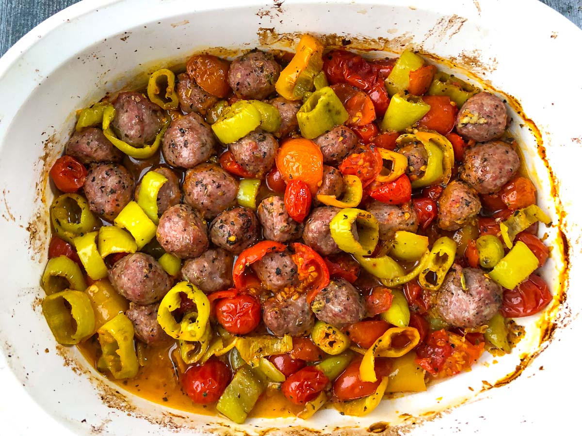 closeup of baked sausage and peppers