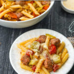 white bowl and plate with stuffed banana pepper pasta with text