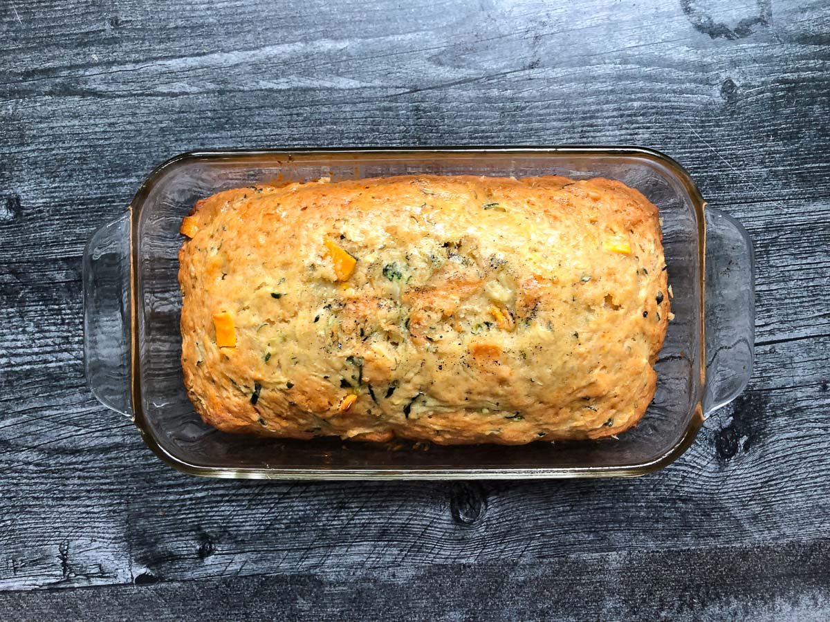 bread pan with finished loaf of quick bread