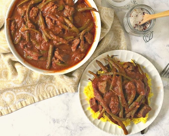 Zesty garlic and tomato sauce is the perfect complement to the green beans and beef in this Green Bean Stew. Serve over rice for a delicious meal. You can also make this in the Instant Pot!