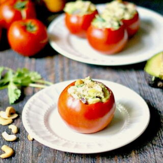 These tomatoes stuffed with curried chicken salad are a delicious way to use those fresh tomatoes from the garden. The flavorful chicken salad is nested in the cool tomatoes and makes a delicious lunch!