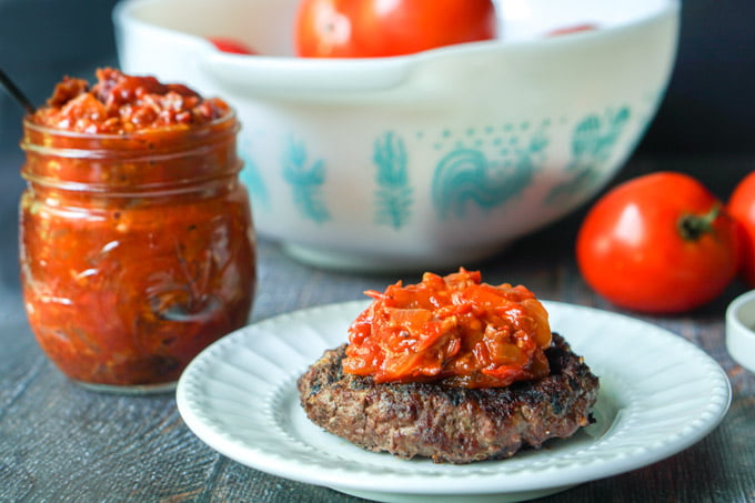 This low carb tomato jam is packed with flavor from the caramelized onions to the bacon to the sweetness of the tomatoes. Perfect on burgers, chicken or fish. Only 3.1g net carbs for 2 tablespoons!