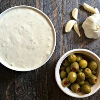 My mom's green olive & garlic veggie dip is a welcome change from your everyday ranch vegetable dip. Garlic, green olives and spices give it a special taste and it's low carb with only 0.6 net carbs per serving.