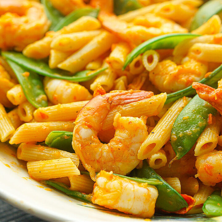 closeup of red pepper shrimp pasta in a big bowl