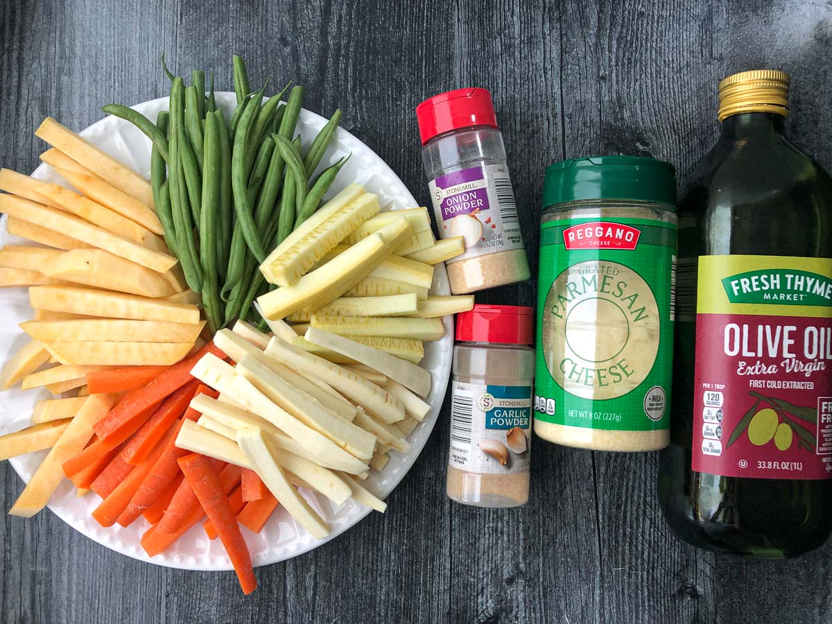 recipe ingredients - cut vegetables, spices parmesan, olive oil