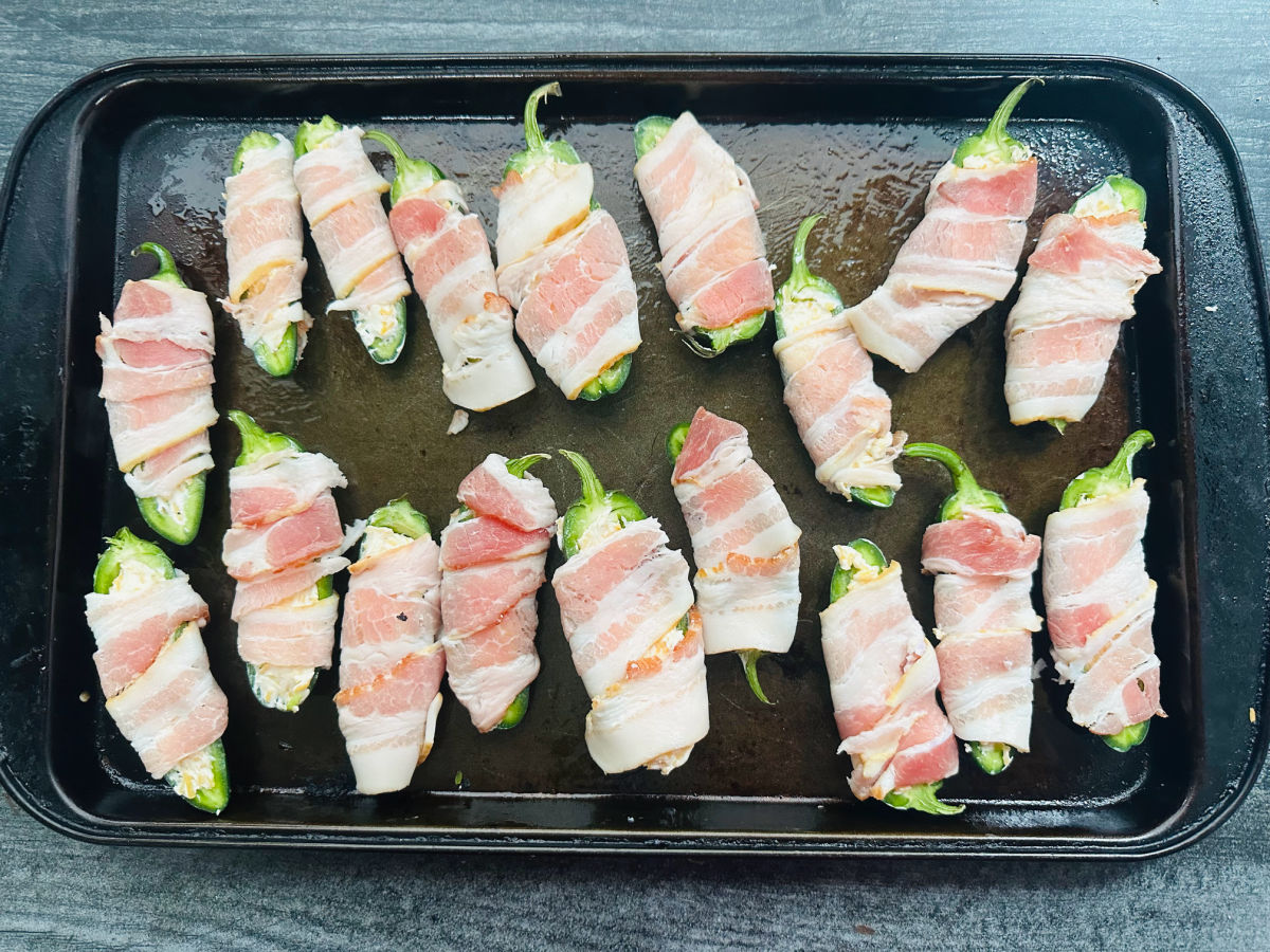 bacon wrapped jalapeno poppers ready to bake