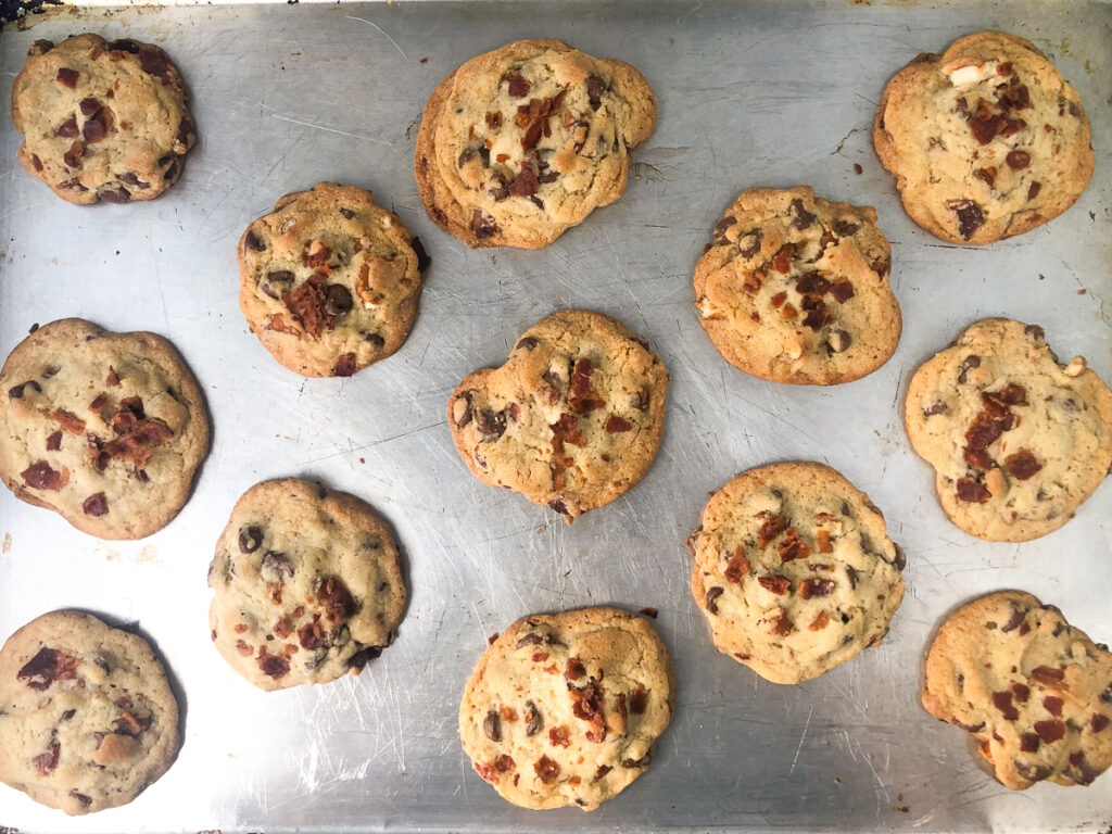 cookie sheet with baked fresh chocolate chips cookies