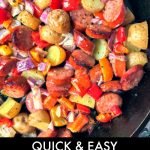 cast iron skillet with easy kielbasa recipe with potatoes & peppers and text overlay