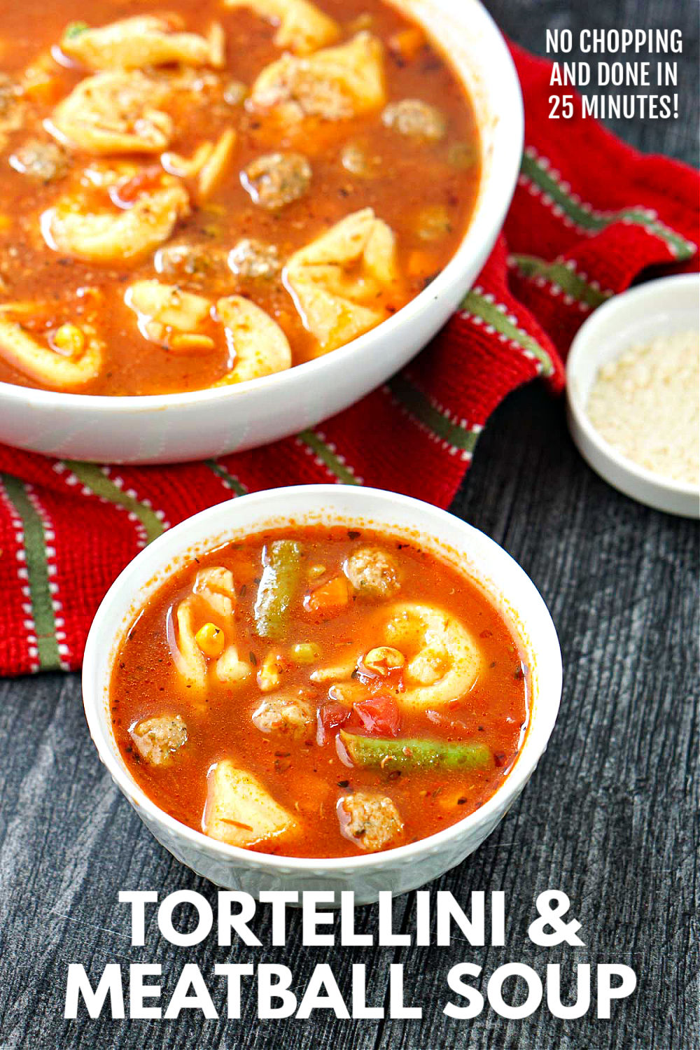 Italian tortellini soup with meatballs and grate cheese and text