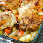 finished roasted chicken with potatoes and carrots with text
