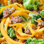 pan of sausage and butternut noodles with text