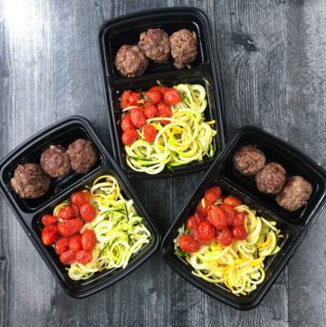 3 freezer containers with meatball and zucchini noodle meals