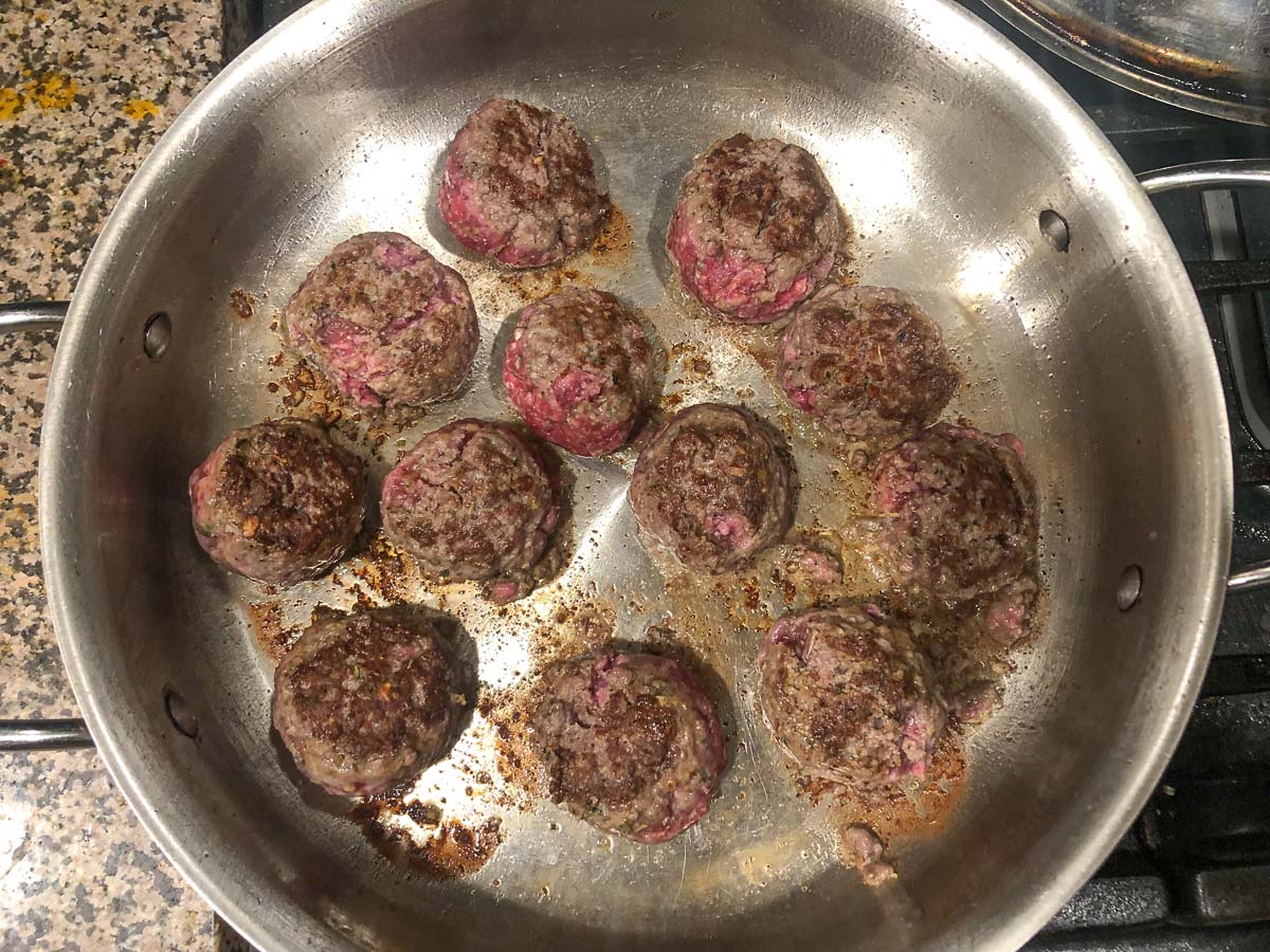 pan with browned paleo meatballs