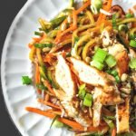 This crunchy, Asian veggie noodle salad is a delicious way to eat your veggies. Top with grilled chicken for a complete meal. Easy and tasty.